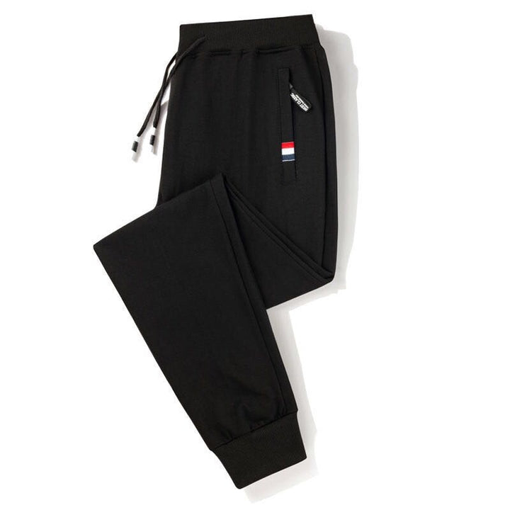Heren comfortabele sportbroek, ideaal voor casual vrijetijdskleding en actieve dagen. Zwart.