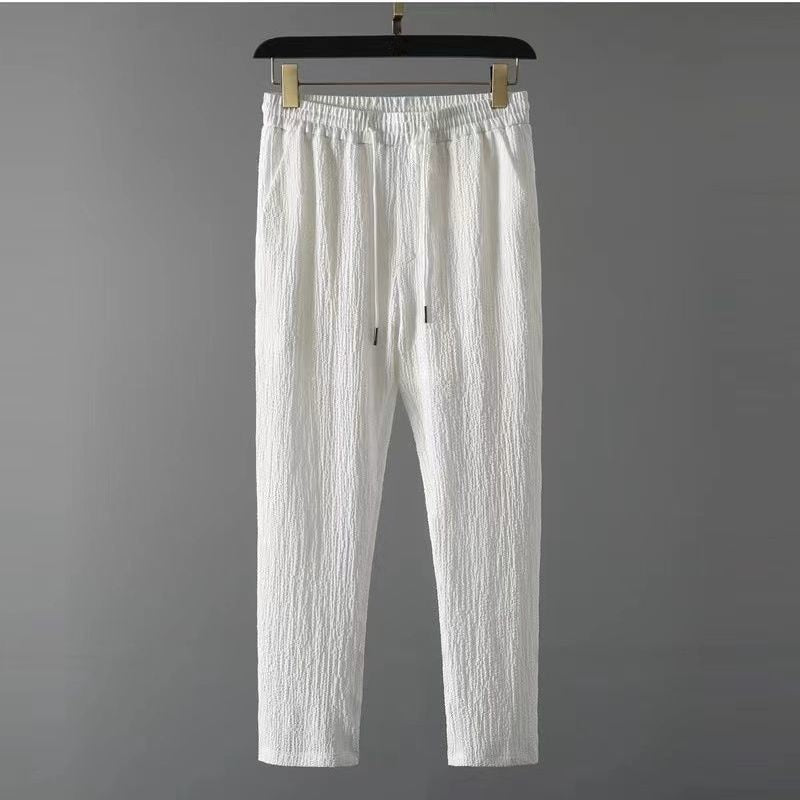 Comfortabele heren kledingset voor de zomer. Ademend shirt & broek, perfect voor een relaxte, stijlvolle outfit.