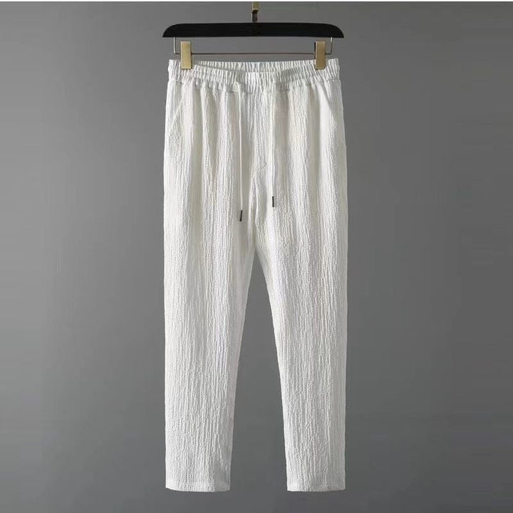 Comfortabele heren kledingset voor de zomer. Ademend shirt & broek, perfect voor een relaxte, stijlvolle outfit.