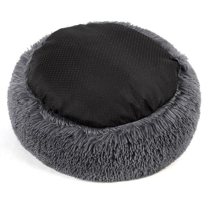 Beige pluche Didi Donut kattenmand, een warme en zachte slaapplek voor je huisdier.