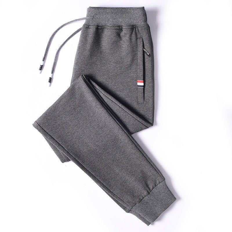 Stijlvolle heren joggingbroek voor dagelijks gebruik, combineert comfort en veelzijdigheid. Grijs.