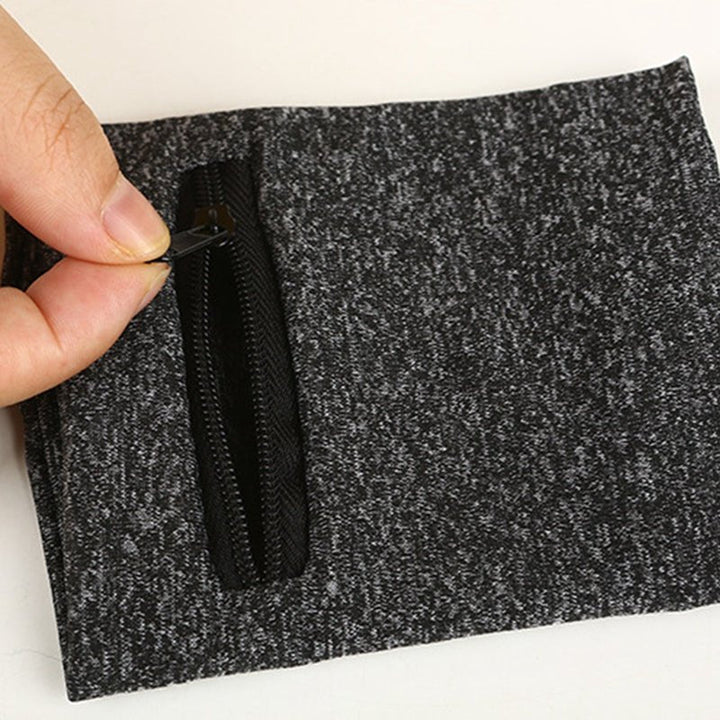 Unisex polsband met ritsvak voor sport en dagelijks gebruik. Een comfortabel accessoire om essentials op te bergen.