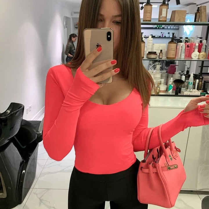 Modieuze dames top bodysuit met lange mouwen, een essentieel kledingstuk voor elke stijl.