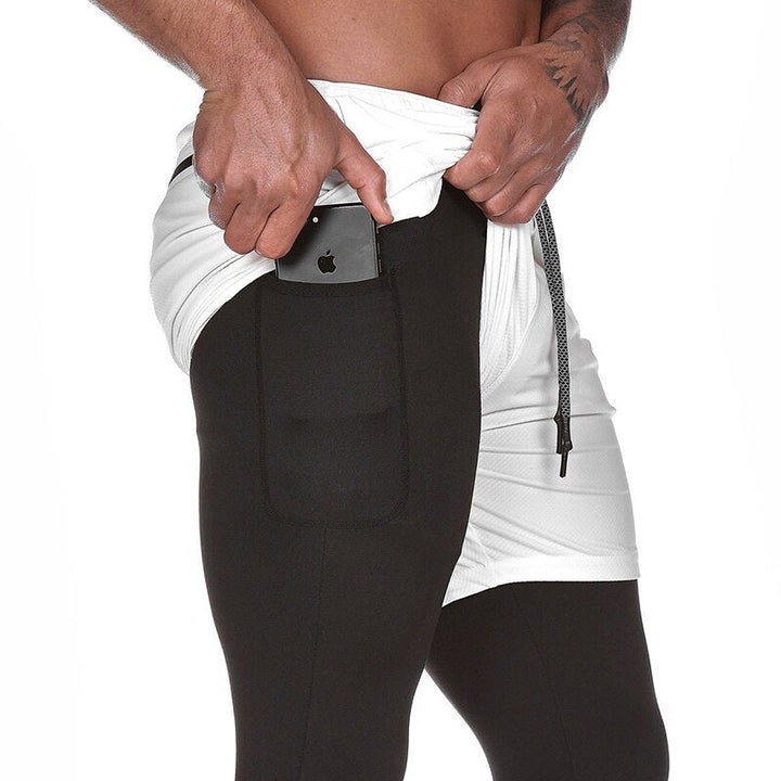 Heren hardloopbroek met geïntegreerde telefoonzak. Essentieel voor veilig opbergen van je smartphone tijdens running.