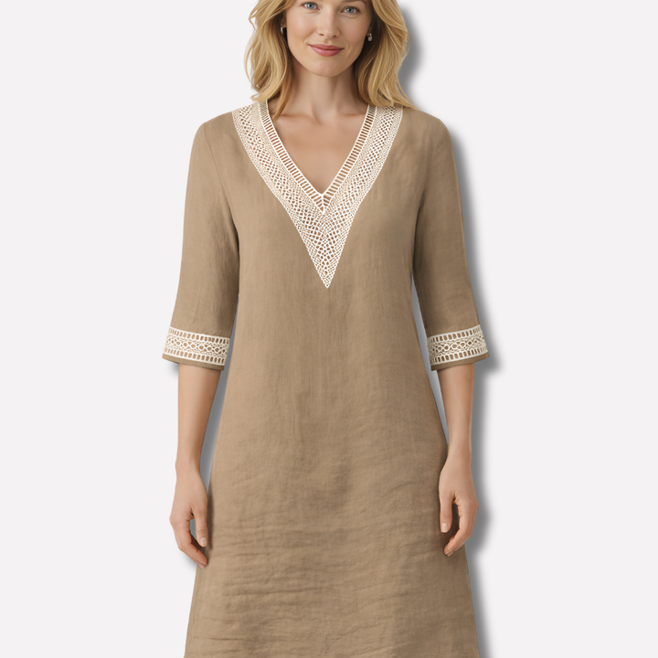 Casual dames V-hals mini-jurk van katoenmix. Deze comfortabele lente-/zomerjurk heeft een losse pasvorm.