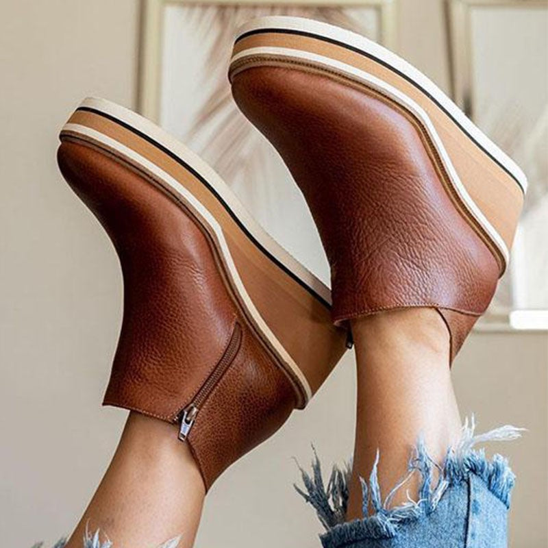 Zwarte modieuze Mira plateau enkellaarsjes voor dames, comfortabel met een trendy plateauzool.
