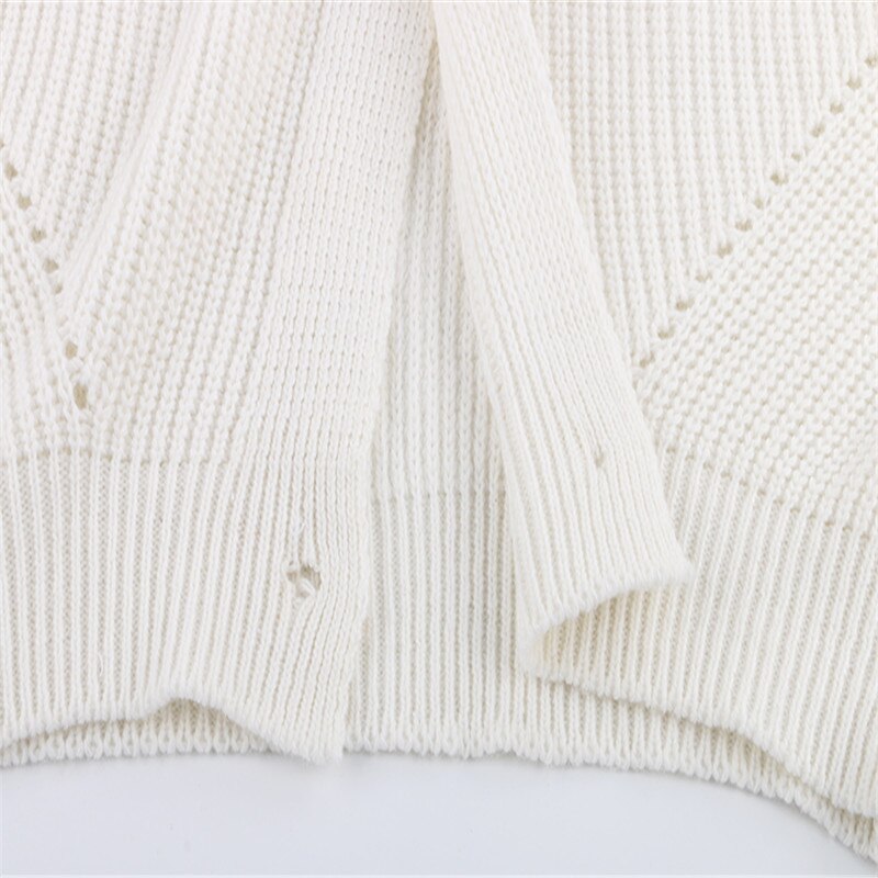Veelzijdige dames pullover of geknoopt vest met lange mouwen. Comfortabele losse pasvorm, ideaal voor elke dag.