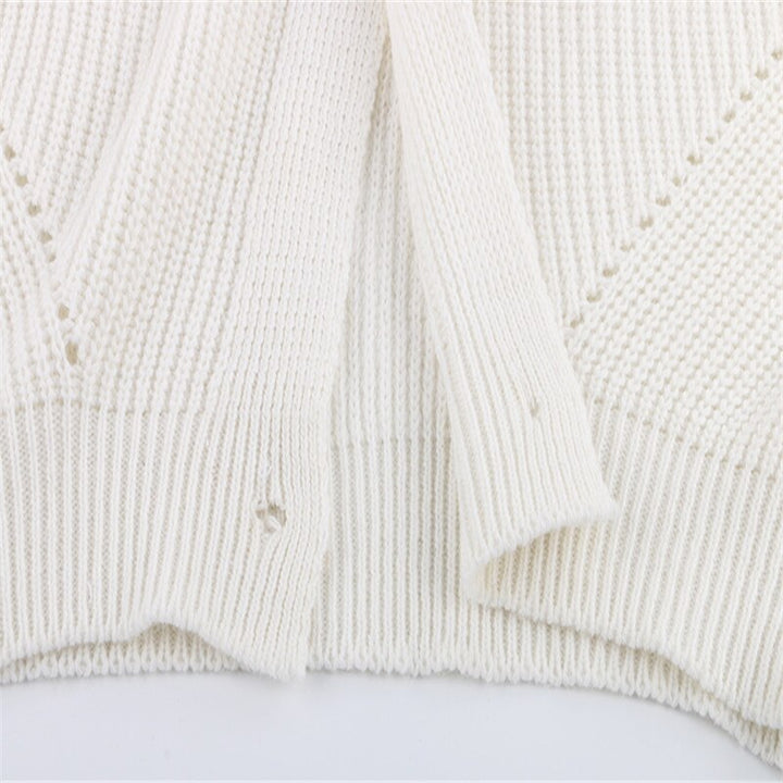 Veelzijdige dames pullover of geknoopt vest met lange mouwen. Comfortabele losse pasvorm, ideaal voor elke dag.