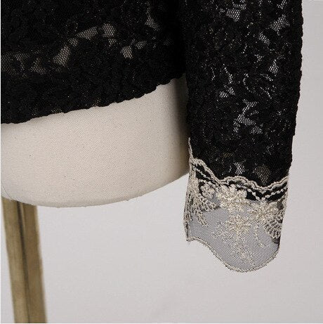 Elegante damesblouse met rijke borduursels en kanten details. Perfect voor een sophisticated look.