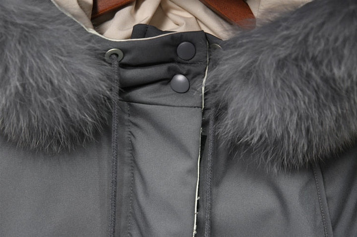 Zwarte elegante dames thermojas, comfortabele winterjas met een modieuze uitstraling.