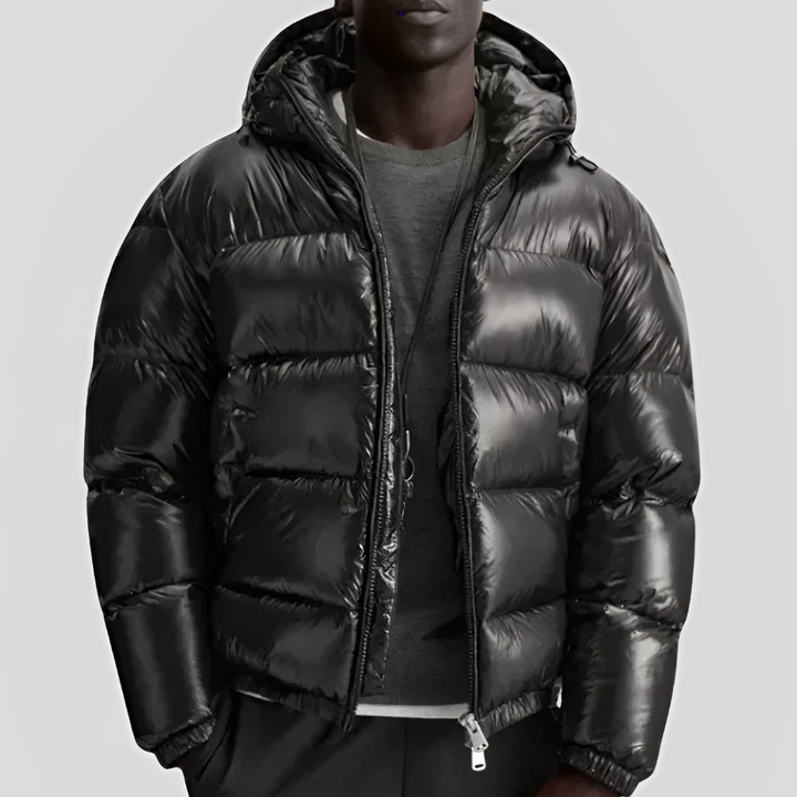 Zwarte gewatteerde heren winter pufferjas, comfortabel en stijlvol voor casual buitenkleding.