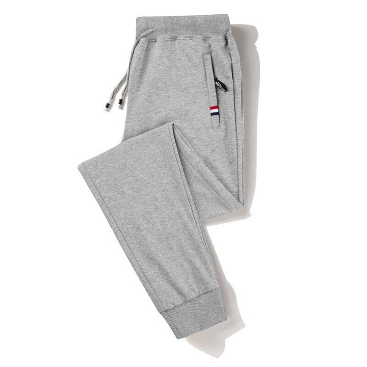 Comfortabele heren trackpants, perfect voor sport, ontspanning of casual uitjes. Blauw.