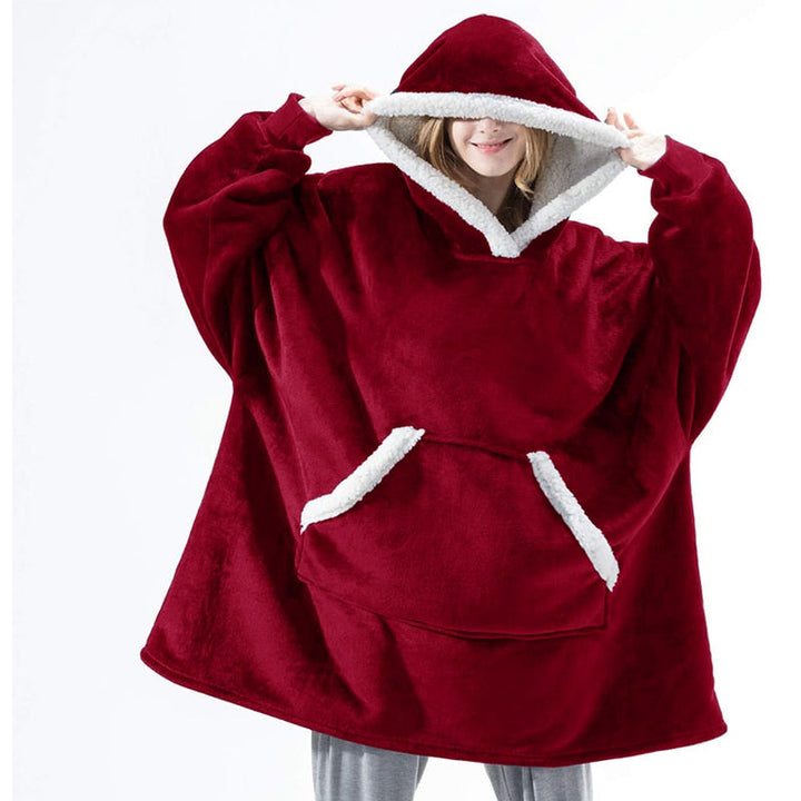 Zachte comfortabele deken hoodie, ideaal voor koude winteravonden thuis.