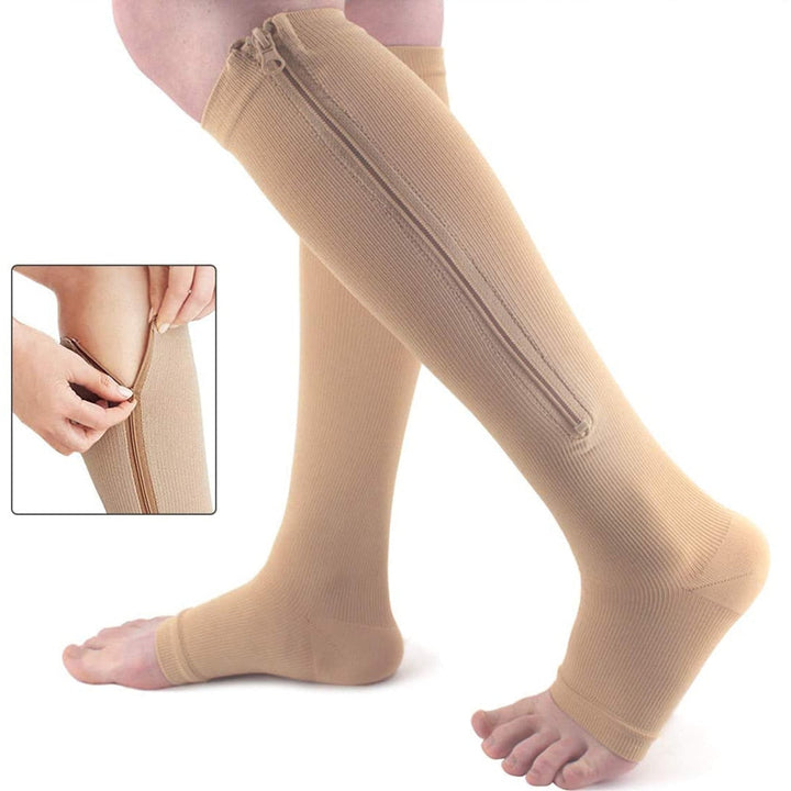 Unisex steunkousen met rits, bieden compressie en verlichting voor vermoeide benen. Ideaal voor dagelijks comfort.