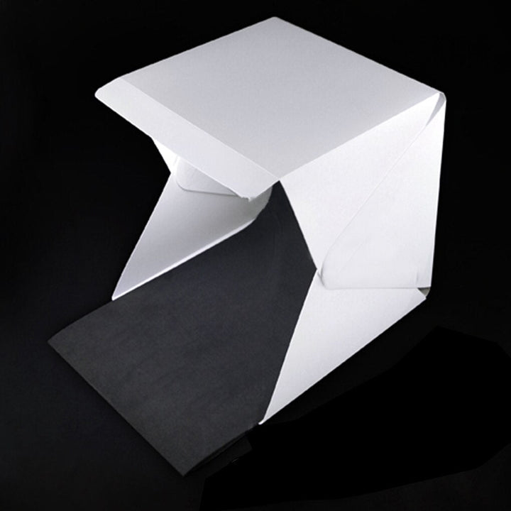 Compacte, snel op te zetten draagbare fotostudio GlowBox voor scherpe, professionele productfoto's thuis.