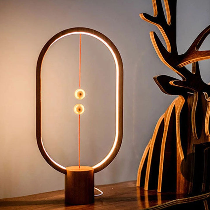 Moderne LED tafellamp met zwevend licht effect. Sfeerverlichting voor woonkamer of slaapkamer.