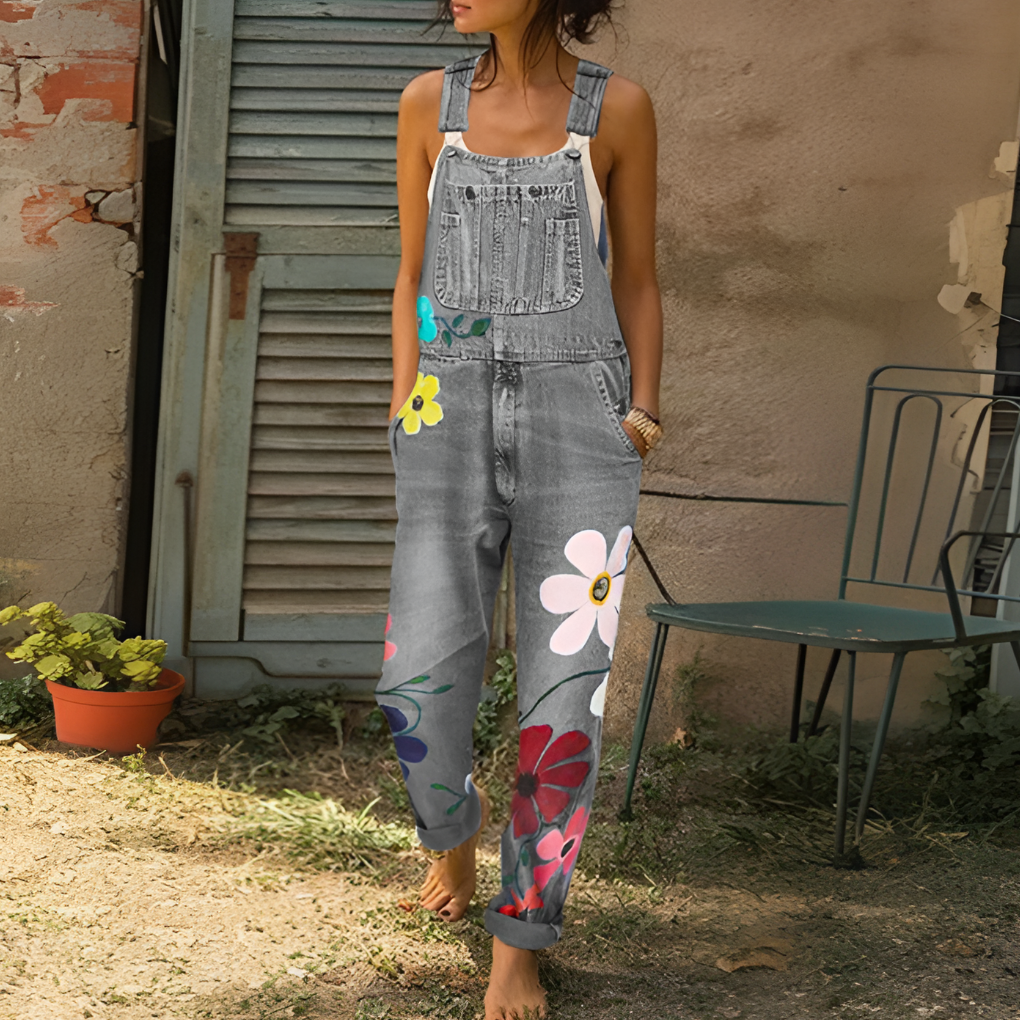 Comfortabele denim dames jumpsuit met bloemenprint en ritssluiting, een veelzijdige en complete outfit.