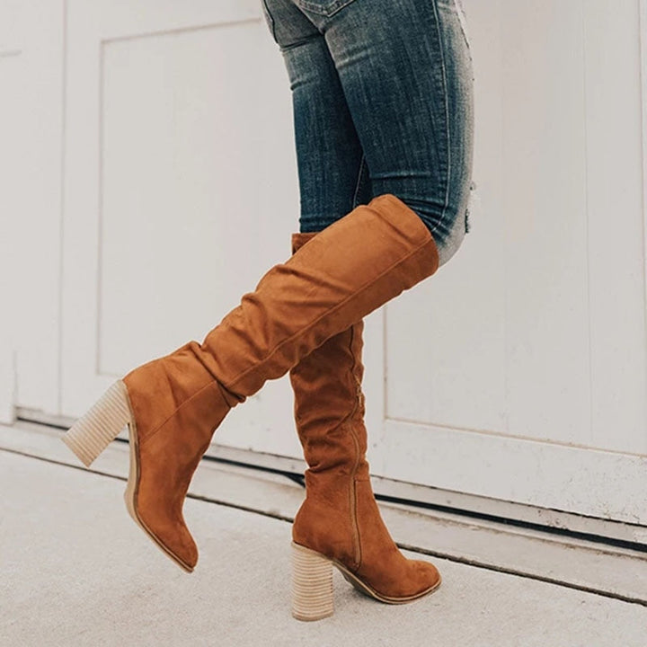 Zwarte EdithBoots dames knielaarzen met hoge hak, elegant en comfortabel, perfect voor winter en herfst.