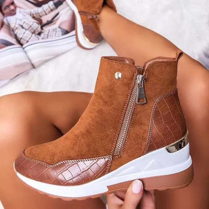 Dames enkellaars met rits, combineert comfort en elegantie. Essentiële damesschoenen voor de moderne vrouw.