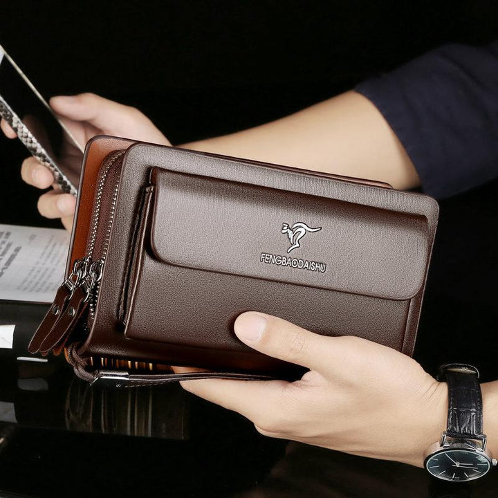Compacte leren heren clutch, ideaal voor pasjes en contant geld.