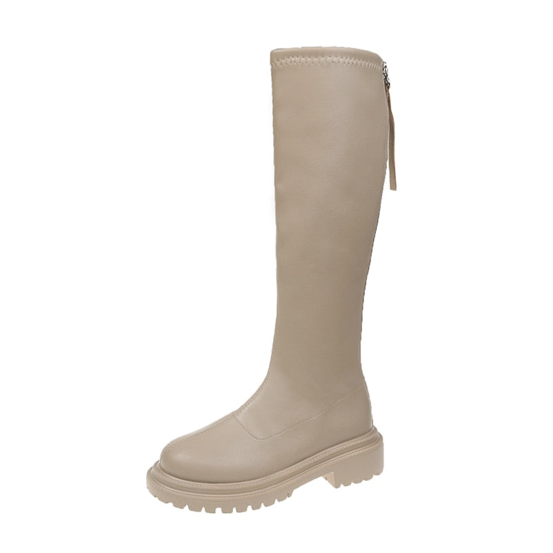 Zwarte, comfortabele kniehoge winterlaarzen voor dames, met ritssluiting en warme voering.