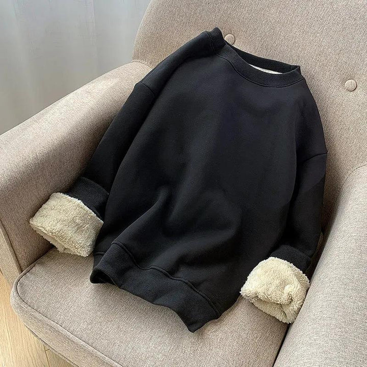Comfortabele en warme gevoerde dames trui. De KarasShirt winterkleding met lange mouwen is perfect voor casual look.
