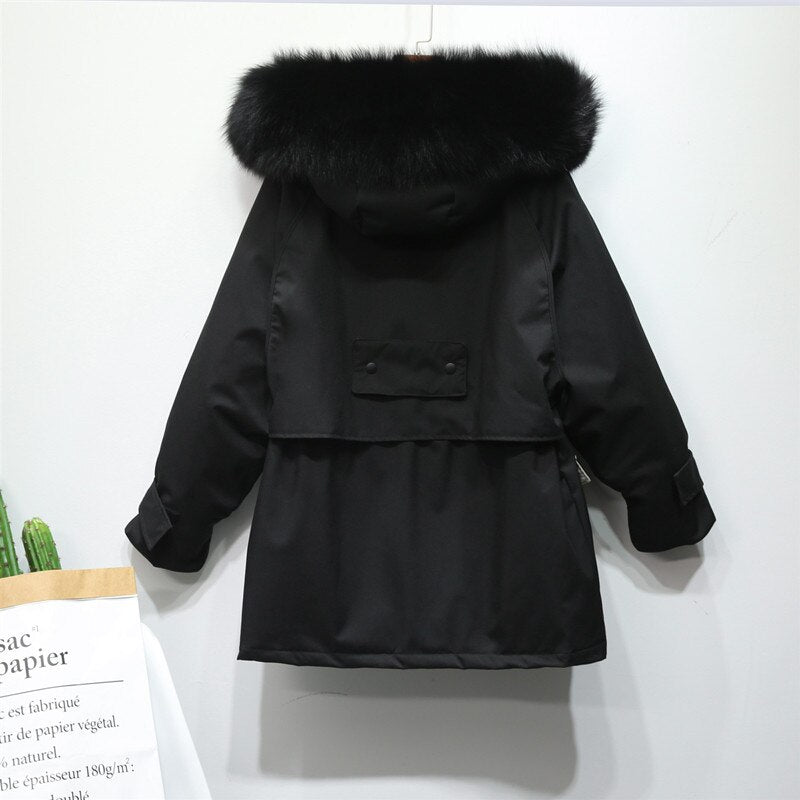 Blauwe luxe dames winterjas, thermisch en elegant, ideaal voor koude dagen. Warmte.