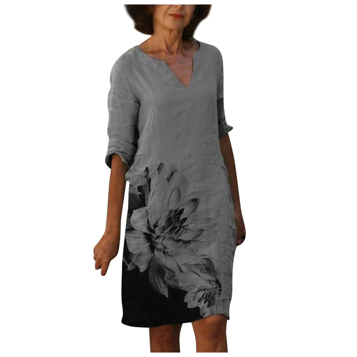 Vintage dames A-lijn jurk met driekwart mouw en delicate bloemenprint, veelzijdig en stijlvol.