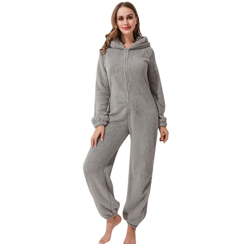 Roze dames winter jumpsuit, ultiem comfort en warmte voor knusse momenten als pyjama.