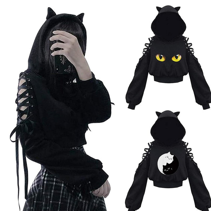 Zwarte dames kattenhoodie met oren, comfortabel en speels, perfect voor een casual look.