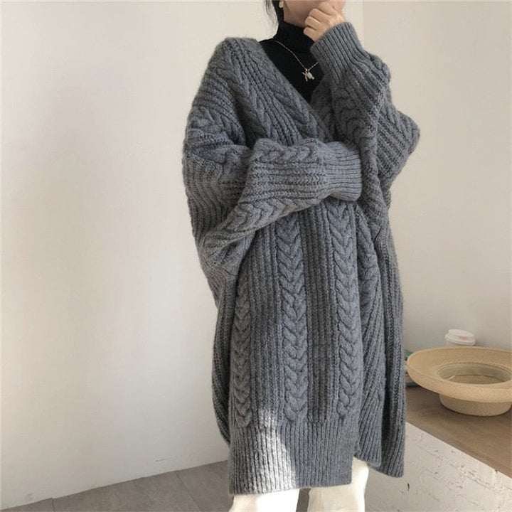 Grijs wollen damesvest, één maat. Stijlvol en warm, een essentieel kledingstuk voor vrouwenmode.