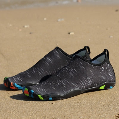 Beschermende unisex waterschoenen voor comfort tijdens watersport, zwemmen en outdoor activiteiten.