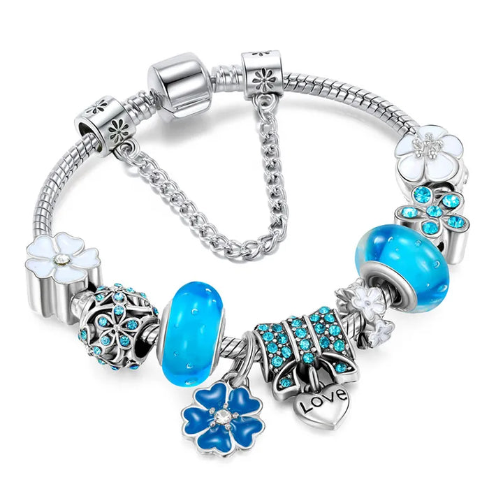 Zilveren damesarmband met elegante bloemen charms, gemaakt van 925 sterling zilver.