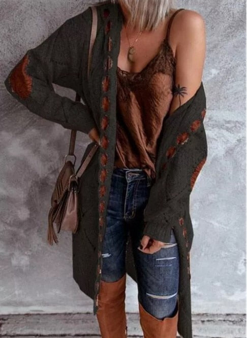 Modern damesvest met capuchon, lang model voor een casual chique en comfortabele uitstraling.