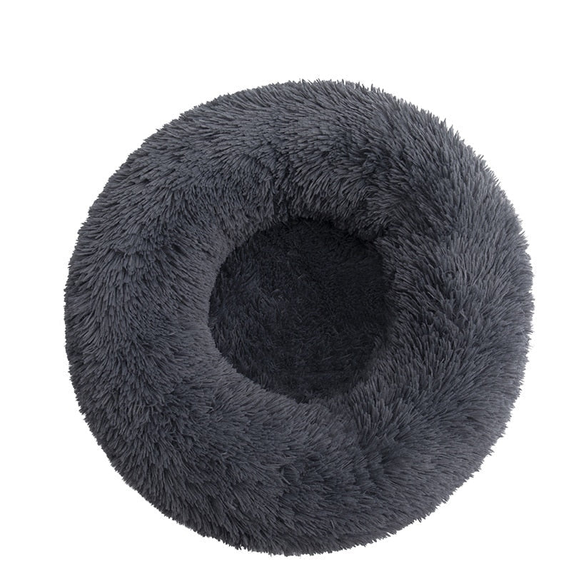 Kalmerende Didi Donut huisdierenbed van pluche, biedt geborgenheid en een fijne rustplek.