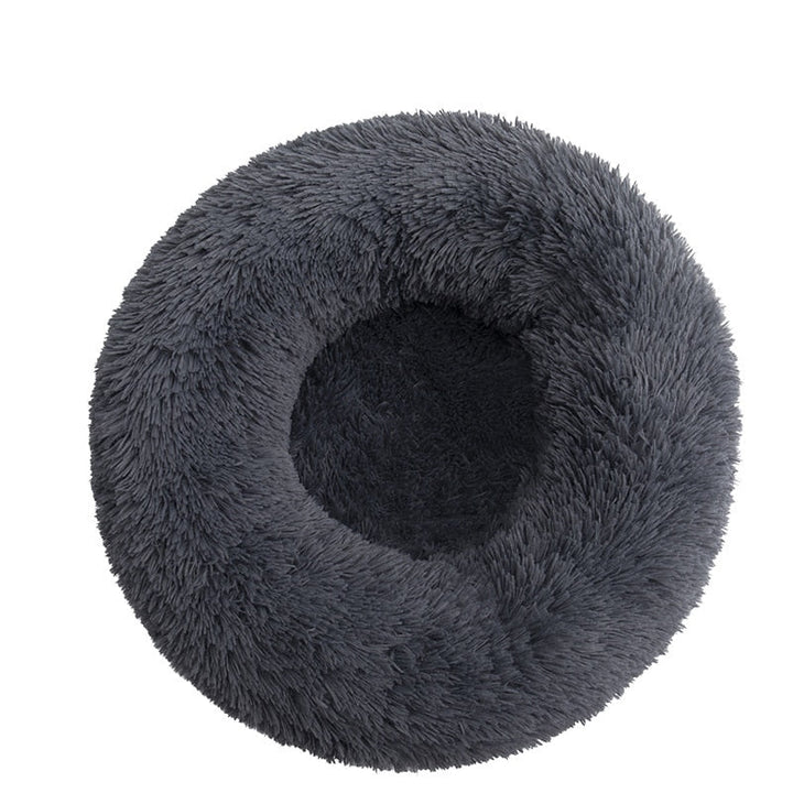 Kalmerende Didi Donut huisdierenbed van pluche, biedt geborgenheid en een fijne rustplek.