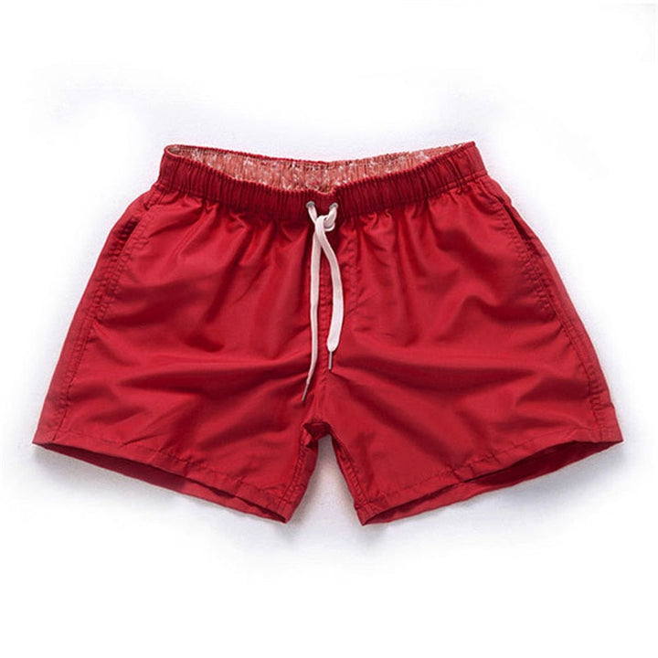 Korte heren zwemshort, modern en opvallend, voor een sportieve look op het strand.