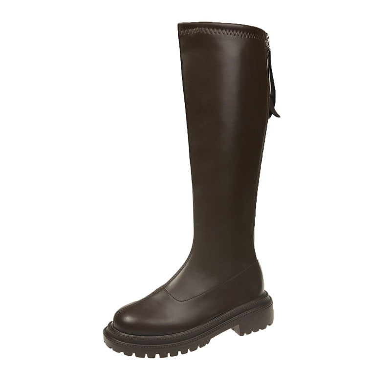 Elegante kniehoge winterlaarzen voor dames in donkerblauw, met warme voering voor optimaal comfort.