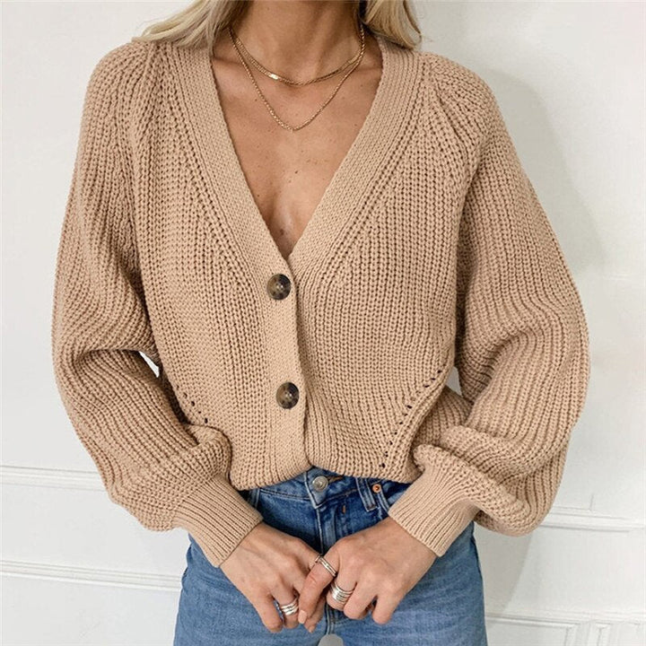 Dames pullover met losse pasvorm en lange mouwen. Stijlvolle en comfortabele geknoopte damesmode, effen design.