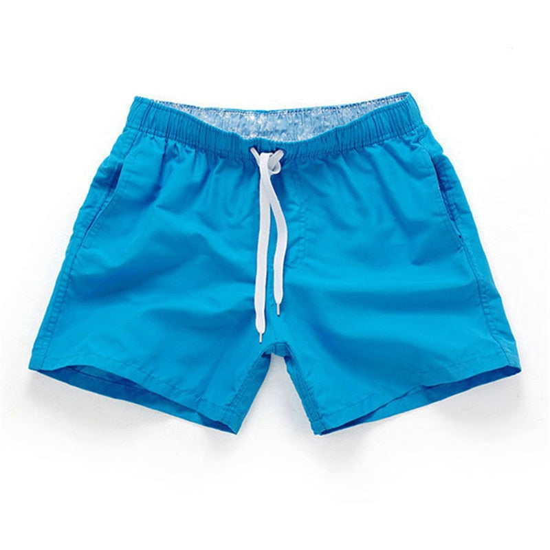 Blauwe heren zwembroek, tijdloos en comfortabel, perfect voor elke vakantie.