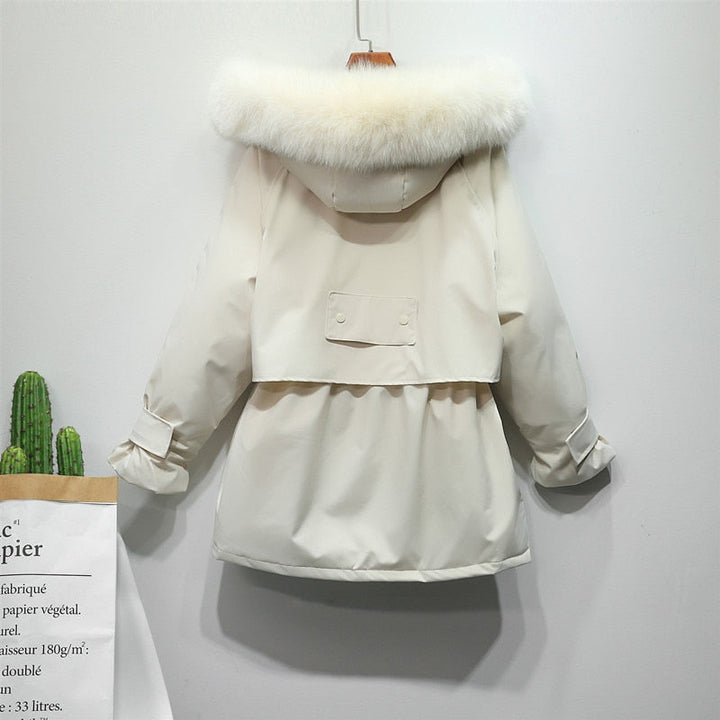 Luxe zwarte dames winterjas, perfect voor comfort en een modieuze uitstraling. Thermojas.