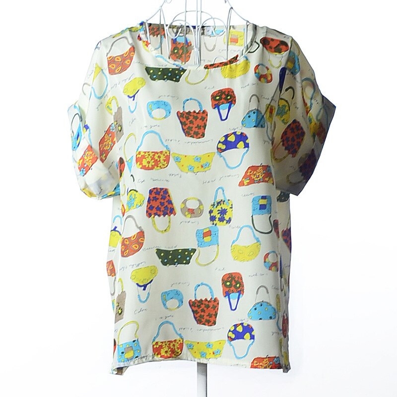 Vrolijk dames zomershirt Klara met patroon, ruimvallend, korte mouwen, casual en modieus voor warme zomerdagen.