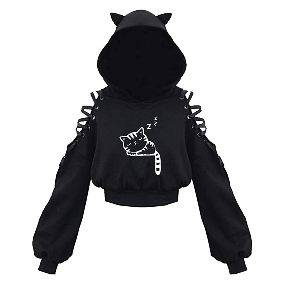 Model draagt zwarte dames kattenhoodie met oren, toont casual en comfortabele pasvorm.