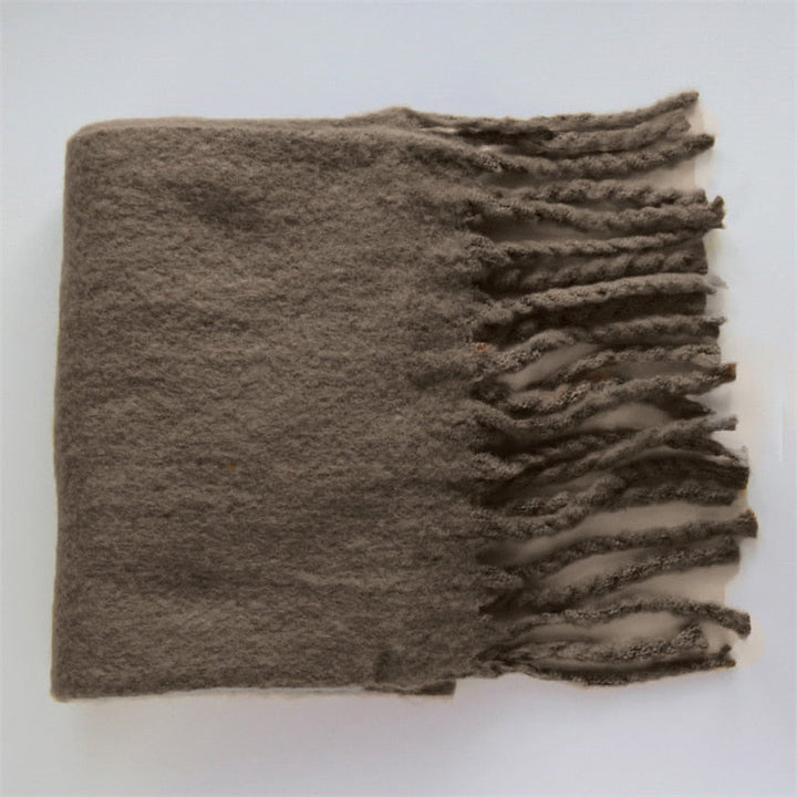Dames halswarmer van wol, een comfortabele en stijlvolle keuze voor koude winterdagen.