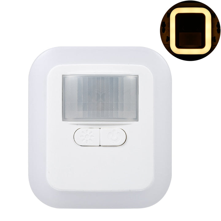 Compact wit LED nachtlicht, strak design, met ingebouwde bewegingssensor voor moderne huisverlichting.