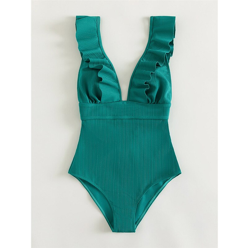 Diepe V-hals dames badpak, boho design met ruches. Comfortabele en trendy zwemkleding voor de zomer.