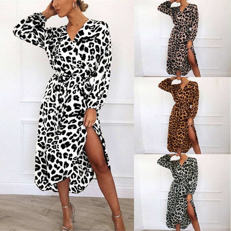 Dames luipaardprint zomerjurk: een trendy wikkeljurk met pofmouwen en een flatterende midi lengte voor elke gelegenheid.