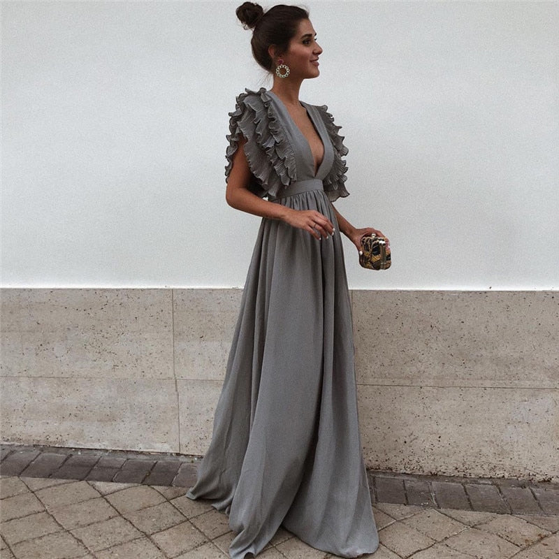 Luchtige zomer maxi jurk voor dames met vloeiende stof. Comfortabele casual jurk, perfect voor warme dagen of strand.