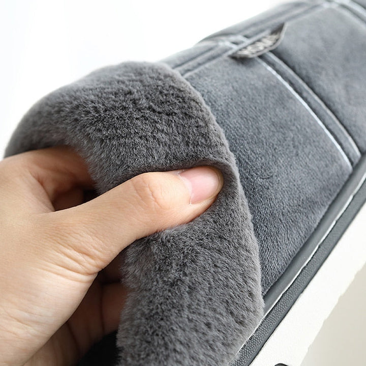 Comfortabele heren pantoffels met pluche voering, perfect voor warme en stijlvolle voeten.
