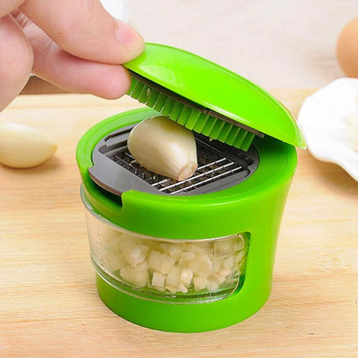 Handige knoflookpers voor moeiteloos koken. Geen knoflookgeur aan handen meer. Essentieel keukengerei.